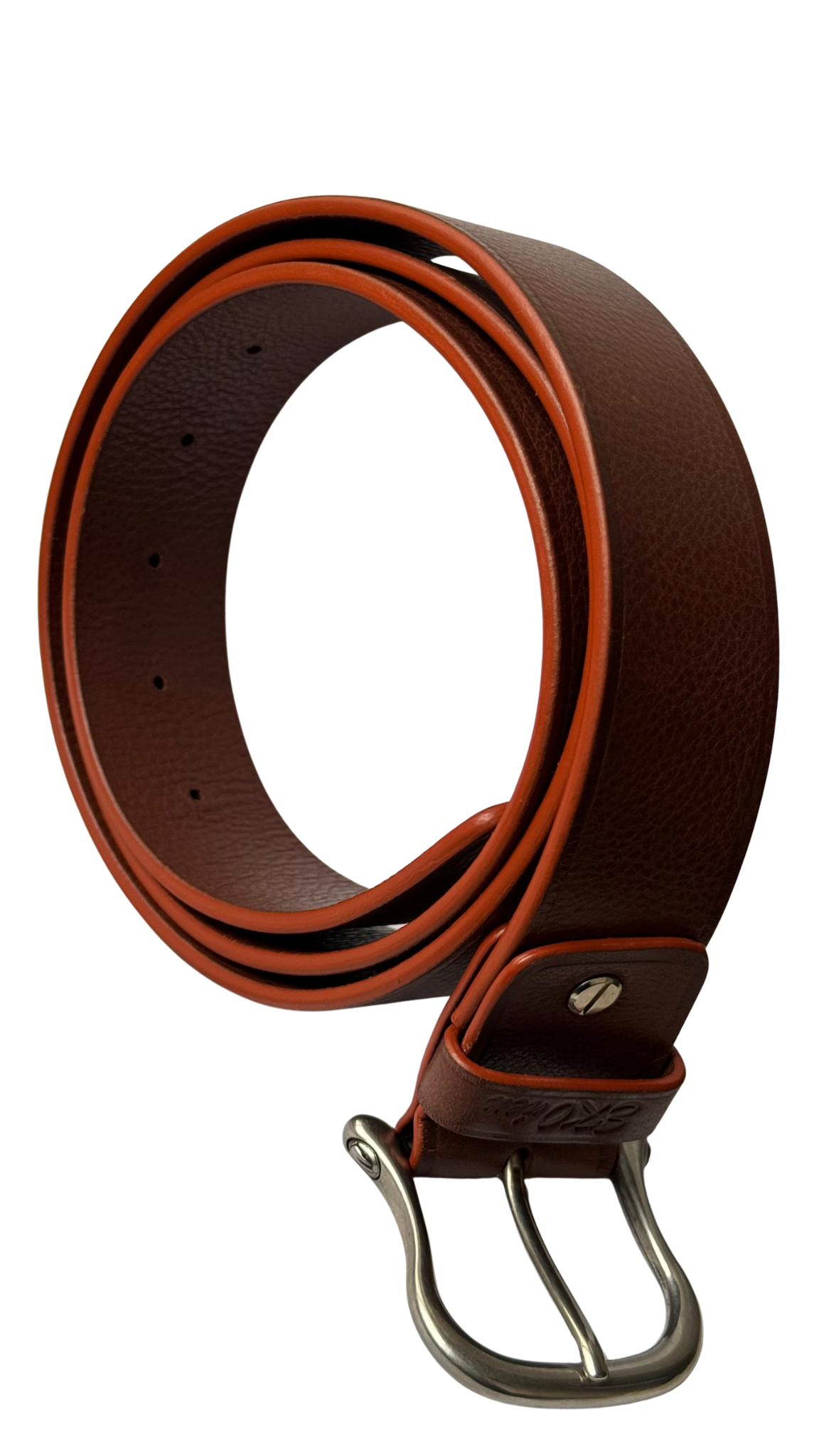Coiled brown Lazzaro leather belt showing its metal buckle and prong, embossed leather keeper, screw attachment, and contrasting reddish edges.